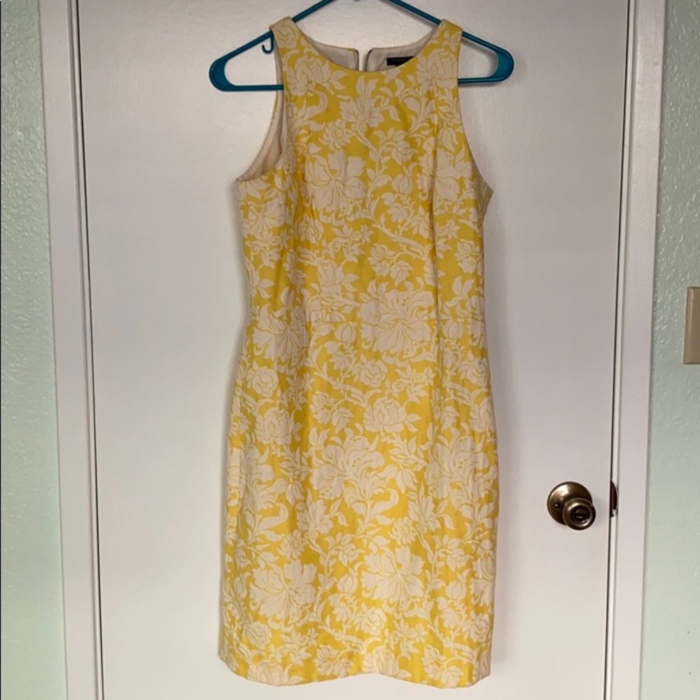 Cute yellow cocktail dress w white floral pattern